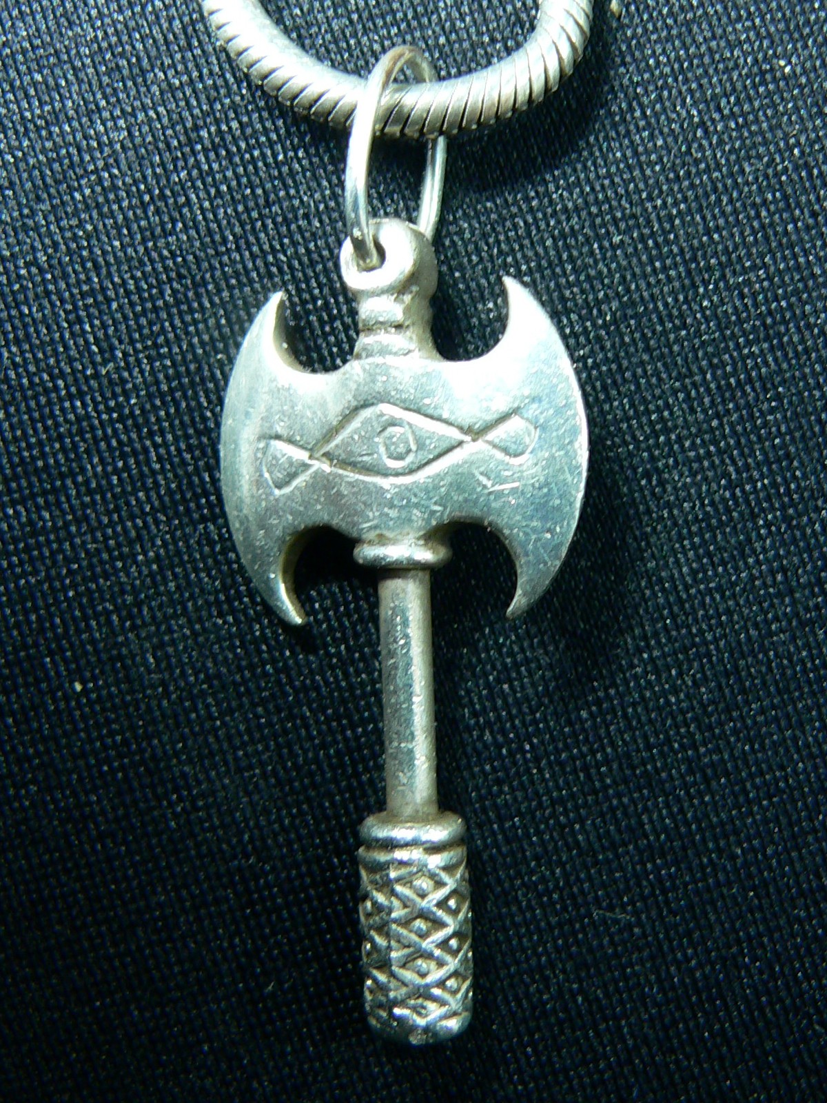 Pendant with the double-headed labrys motif